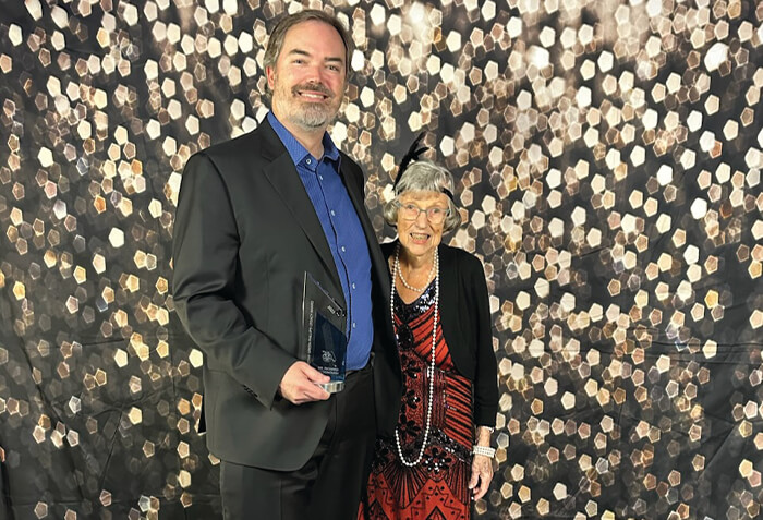 Dorothy Green Phillips presents FCS medical oncologist Richard McDonough, MD with the 2023 Dorothy Green Phillips Legacy Award.
