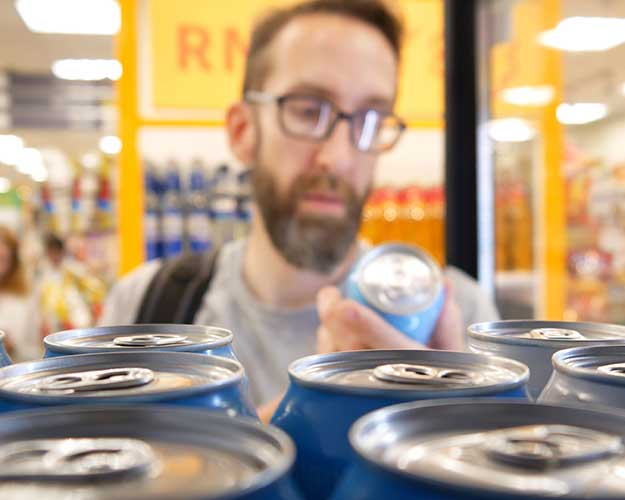 Man reading can label